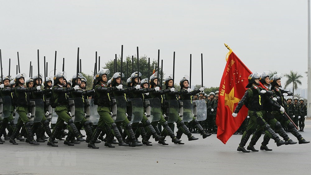 Policias vietnamitas por garantizar seguridad de magna cita del Partido hinh anh 4